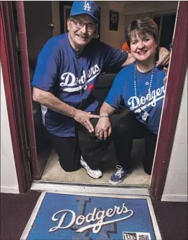  ?? Kent Nishimura Los Angeles Times ?? THEIR DEVOTION to the Dodgers is being pushed for Bill Snoberger and Mary Jones, who have had a 45% price increase over two years for two season tickets.