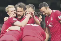  ??  ?? Stevie May, second left, celebrates his goal against St Mirren.