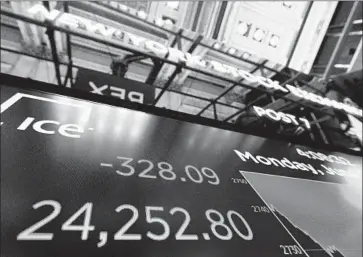  ?? Justin Lane EPA/Shuttersto­ck ?? THE DOW has come down 5% from its peak during the last couple of weeks and is now in the red for the year.