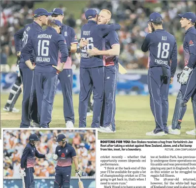  ??  ?? Ben Stokes receives a hug from Yorkshire’s Joe Root after taking a wicket against New Zealand, above, and a fist bump from him, inset, for a boundary.