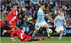  ?? ?? Gabri Veiga skips past Rayo Vallecano's midfielder Pathé Ciss in Celta Vigo’s 3-0 win on Saturday. Photograph: Salvador Sas/EPA