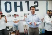  ?? JOHN MINCHILLO — THE ASSOCIATED PRESS FILE ?? Franklin County Recorder Danny O’Connor, center, the Democratic candidate running to succeed former Republican U.S. Rep. Pat Tiberi in Ohio’s 12th District, speaks to volunteers and supporters at his campaign headquarte­rs in Columbus.