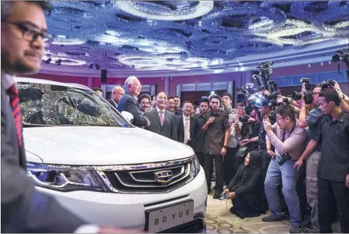  ?? CHARLES PERTWEE / BLOOMBERG ?? Geely’s move to acquire Proton in the limelight. More global acquisitio­n to follow suit backed on the Belt and Road Initiative.