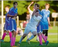  ?? SARAH GORDON/ THE DAY ?? Stonington’s Jack Cullen, front, celebrates a goal during Wednesday’s high school boys’ soccer game against Bacon Academy at Stonington High School. Stonington won the game 3-2, earning the Bears the ECC Division II title.