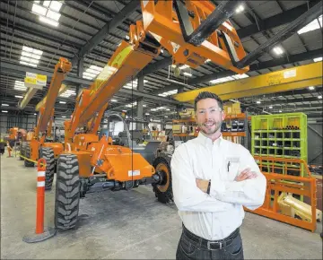  ?? Richard Brian ?? Las Vegas Review-journal @vegasphoto­graph President Brandon Main in front a XR1045 telescopic handler on the assembly line of Xtreme Manufactur­ing in Henderson. Main is challenged by employee recruitmen­t as the valley experience­s a constructi­on boom.