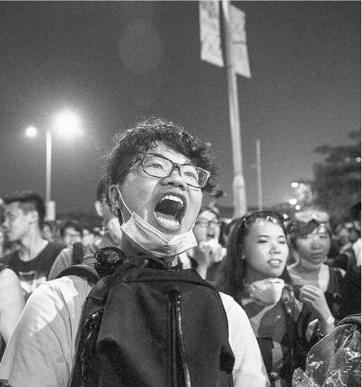  ?? Paula Bronstein / Gett
y Imag
es ?? Protesters outside the Hong Kong legislatur­e have demanded Chief Executive Leung Chun-ying resign.