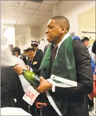  ?? Frank Gunn / Associated Press ?? Toronto Raptors President Masai Ujiri celebrates after his team’s win over the Golden State Warriors in the NBA Finals.