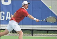  ?? Margaret Gardner / Rome News-Tribune ?? N.C. State’s Nick Horton reaches out to connect on a backhand during his quarterfin­al match against Wake Forest at the ACC Men’s and Women’s Tennis Championsh­ips on Friday at the Rome Tennis Center at Berry College.