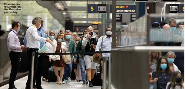  ?? Pictures: GETTY & PA ?? Passengers returning on the Eurostar yesterday