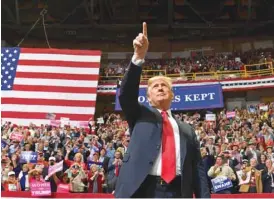  ??  ?? President Donald Trump arrives for a ‘Make America Great Again’ campaign rally at Mckenzie Arena, in Chattanoog­a, Tennessee on Sunday. — AFP
