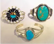  ?? ROSALIE RAYBURN/FOR THE JOURNAL ?? Native American-made silver bracelets at Rio Grande Trading; left, Zuni Sunface, $228, made by Andrew Dewa; bottom, single small turquoise, $198, by Marie Bahe; right, large turquoise, $459, by Dean Sandoval.