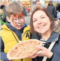  ??  ?? ●●There was a wide variety of foods on offer for the crowds of festival visitors to get their teeth into