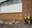  ?? TYLER RIGG — THE NEWS-HERALD ?? Terri Cain, left, and Jeff Malish, campaign chair for the West End Y, pose near the new building.