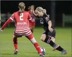  ??  ?? Katrina Parrock taking on Seana Cooke of Shelbourne in Tuesday’s Continenta­l Tyres National Women’s League tie in Ferrycarri­g Park.