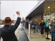  ?? STAFF / FILE ?? Fairfield Mayor Steve Miller pumps his fist after rallying a crowd of more than 200 people who lined up to be the first to shop at a newly constructe­d ALDI that opened in Fairfield in January 2019.