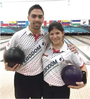  ??  ?? Astrid Valiente y Fidel Osiris Marchena Báez, después de ganar la medalla de oro.