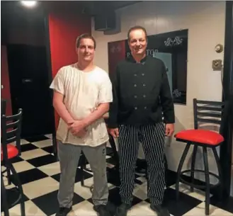  ?? MONICA SAGER — DIGITAL FIRST MEDIA ?? Mike Rohrbach, left, and Donnie Weil, right are the new owners/chefs at The Pit Stop Tavern &amp; Restaurant, 961 N. Reading Ave. in Boyertown. The restaurant, which originally opened in 1964, opened under the new ownership in May.