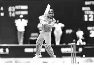  ??  ?? India’s MS Dhoni plays a shot during the third One Day Internatio­nal (ODI) match between West Indies and India, at the Sir Vivian Richards Cricket Ground in St. John’s, Antigua, on June 30, 2107. - AFP photo