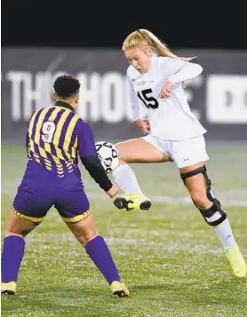  ?? MATT BUTTON/BALTIMORE SUN MEDIA ?? Patterson Mill’s Riley Brown gets control of the loose ball as Loch Raven’s Haley Gordon stays close on defense Thursday at Loyola University in Baltimore.