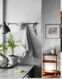  ?? ?? 1 1. A vintage Anglepoise lamp in the kitchen helps soften the clean lines.