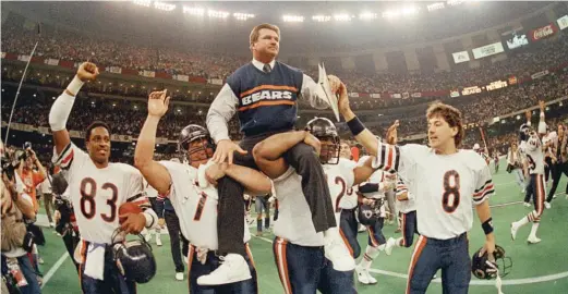  ?? AP FILES ?? Bears players hoist coach Mike Ditka onto their shoulders after defeating the New England Patriots 46-10 in Super Bowl XX on Jan. 26, 1986, in New Orleans.