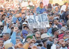  ?? 1995 PHOTO BY TIM SLOAN/ AFP VIA GETTY IMAGES ?? The march’s goal wasn’t to change America, says Kokayi Nosakhere, who attended when he was a 21- year- old student. “The goal was to change us.”