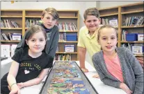  ?? ANDREW WATERMAN/SPECIAL TO THE TELEGRAM ?? Clockwise from left, Lilah Newbury, Luke Parrot, Cole Crane-noonan, and Bridget Powers, all now in Grade 4, participat­ed in the Artssmarts program last year. Luke said, “It was a new learning (experience). … I really liked it.”