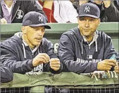  ?? COREY SIPKIN/NEWS ?? Joe Girardi was a teammate, coach & manager to Derek Jeter, who says skipper’s firing is part of the business.