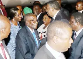  ??  ?? President Mugabe and the First Lady Dr Grace Mugabe arrive in Bulawayo yesterday evening for the ZITF official opening today. They are received at the Joshua Mqabuko Nkomo Internatio­nal Airport by the two Vice Presidents Emmerson Mnangagwa and...