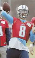  ?? AP PHOTO ?? TOUGH TEST TO PASS: The Patriots defense will need to be wary of Titans quarterbac­k Marcus Mariota.