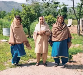  ?? ?? SAKINA BI (from left), Gulzar Bi, and Shamim Akhtar of Dhari Dabsi village in Poonch district. Their husbands were shot dead by Army soldiers on June 27, 2002. They have lived in penury since.