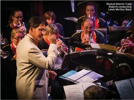  ??  ?? Musical director Craig Roberts conducting Lewis Merthyr Band