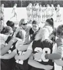  ?? COURTESY ?? Navy women’s soccer coach Carin Gabarra gathers her team in a tight huddle for some final words of encouragem­ent prior to the start of Tuesday night’s first-round NCAA Tournament game against New Mexico.