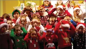  ??  ?? Junior and senior infants pupils at St. Canices Christmas concert in New Ross.