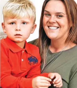  ??  ?? Refused implant: Jacob, four, with his mum Sarah