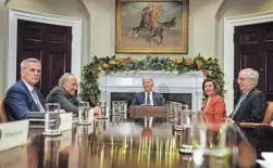  ?? JIM WATSON/AFP VIA GETTY IMAGES ?? President Joe Biden, center, meets with congressio­nal leaders Tuesday at the White House to discuss legislativ­e priorities.