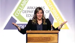  ?? The Sentinel-Record/Donald Cross ?? ■ The final keynote speaker of the Arkansas Department of Education Summit, 2021 Arkansas Teacher of the Year Susana Post, addresses the crowd Wednesday morning in Horner Hall at the Hot Springs Convention Center.