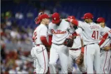  ?? THE ASSOCIATED PRESS ?? Phillies starting pitcher Enyel De Los Santos walks off after being taken out of the game during the fifth inning.