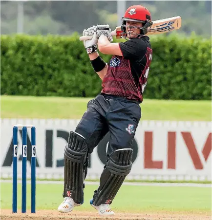  ?? PHOTO: PHOTOSPORT ?? Henry Nicholls notched 122 as Canterbury thumped Northern Districts in the Ford Trophy minor semifinal in Whangarei on Saturday.