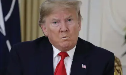  ?? Photograph: Evan Vucci/AP ?? Donald Trump claims the US is doing ‘very well’ out of the trade war.