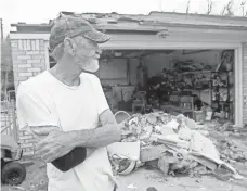  ?? GABE HERNANDEZ, CORPUS CHRISTI (TEXAS) CALLER-TIMES ?? Philip Stevens surveys his home Sunday after part of it was destroyed by Hurricane Harvey in Aransas Pass, Texas.