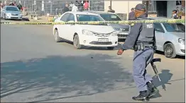  ?? Pictures: RANDELL ROSKRUGES and LULAMILE FENI ?? UNDER SIEGE: Continenta­l Meat Products, top, in Berea in East London was robbed by armed robbers in broad daylight on Thursday. In Mthatha, security guards were robbed of the money they were delivering to an ATM in York Road in the CBD on Thursday...