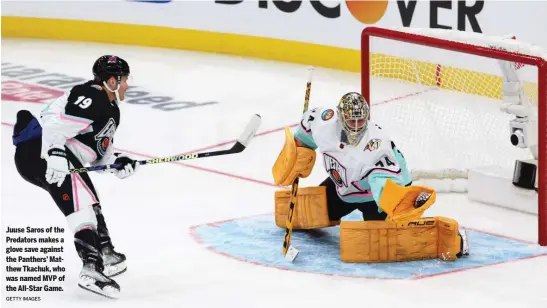  ?? GETTY IMAGES ?? Juuse Saros of the Predators makes a glove save against the Panthers’ Matthew Tkachuk, who was named MVP of the All-Star Game.