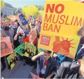  ?? ASSOCIATED PRESS ?? In an order released Monday, Supreme Court justices say the Trump travel ban can take full effect as legal challenges work through the courts.