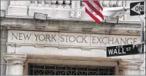  ?? RICHARD DREW / ASSOCIATED PRESS 2014 ?? Global stocks fell Friday amid worries about the potential impact of U.S. trade policies and as investors became more cautious about the longevity and durability of the recent stock rally energized by Donald Trump’s presidenti­al election win.