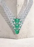  ?? ?? Iwana necklace boasts Colombian emeralds shaped to evoke the green iguana’s dorsal spines.