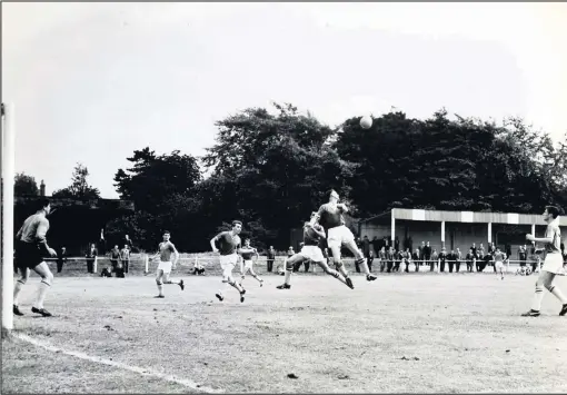  ??  ?? ■ An action shot probably from the 1963-64 season. Brian Broadhurst is pictured third from left with Barry Fowler behind him. Photo supplied by Dave Kirkby.