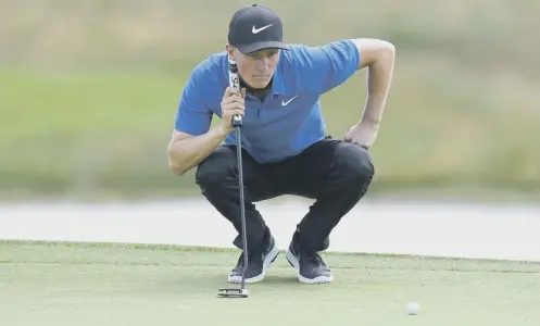  ??  ?? Marcus Kinhult of Sweden lines up his putt on the 14th green during the second round of the HNA Open de France at Le Golf National.