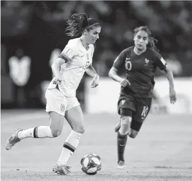  ?? Richard Heathcote / Getty Images ?? Alex Morgan has become more of a facilitato­r and taken on more defensive duties in the her last two matches.