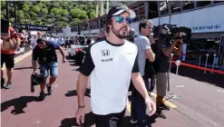 ??  ?? MONACO: This file photo taken on May 22, 2015 shows Mc Laren Honda’s Spanish driver Fernando Alonso in the pit lane of the Monaco Formula One street circuit during the Monaco F1 Grand Prix. McLaren’s former two-time world champion Fernando Alonso will...